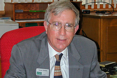 Dr. Gamble in his office