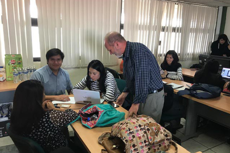 Students working with Dr. Mark Viner during the Consortium for North American Higher Education Faculty Exchange Program