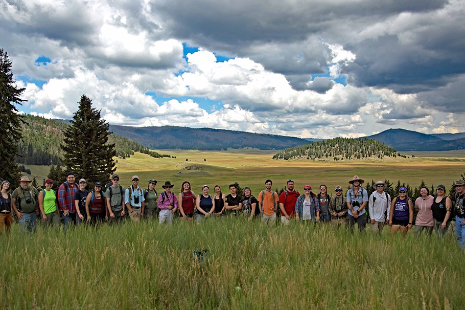 Laramie Mahan, pictured fifth from the left, with students from New Mexico and Tennessee at the Valles Caldera.