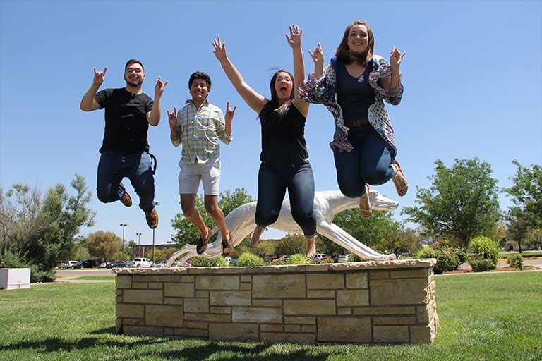 ENMU students jumping for joy