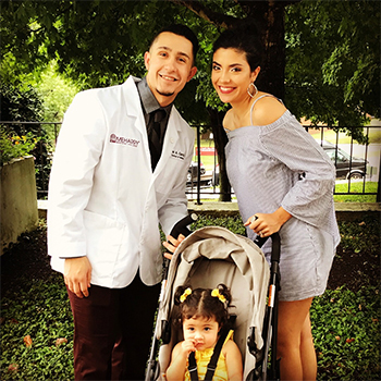 john garcia with wife and daughter