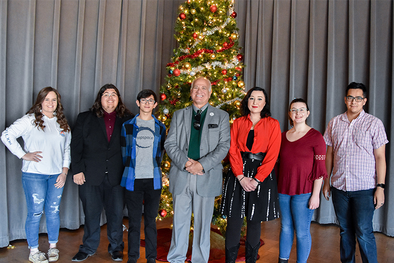 Standing with Dr. Jeff Elwell are student awardees (left to right) Carson Mills, Ryan Boddy, Ryan Hernandez, [Dr. Elwell], Grace Mesarchik, Lacey Harrell and Jorge Aldavaz. Not pictured are Jade Bennett, Sergio Flores, Allen Hank, Chelsea Hatfield, Logan Lingar, Lilianna Mauldin, Samantha Molina, Oliver Puckett and Derek Warner.