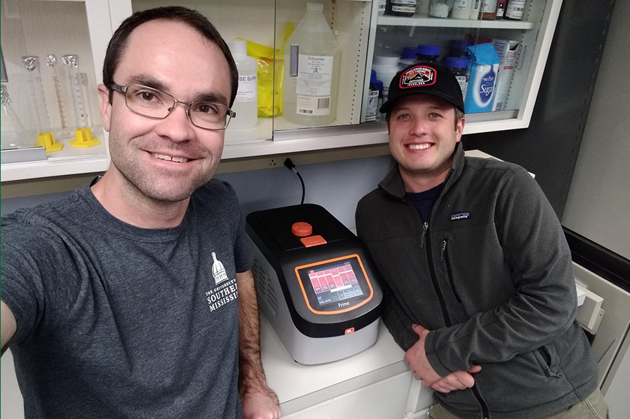 Dr. Jesse Filbrun and Rick Raymondi in the lab.