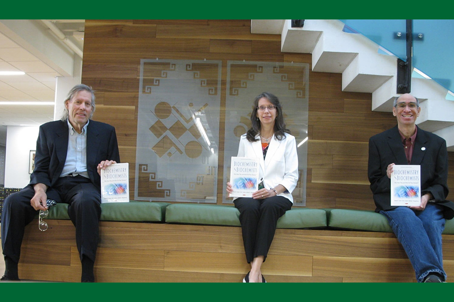 Dr. Michael Shaughnessy, Ann Varela and Dr. Manuel Varela and their new book about biochemists.