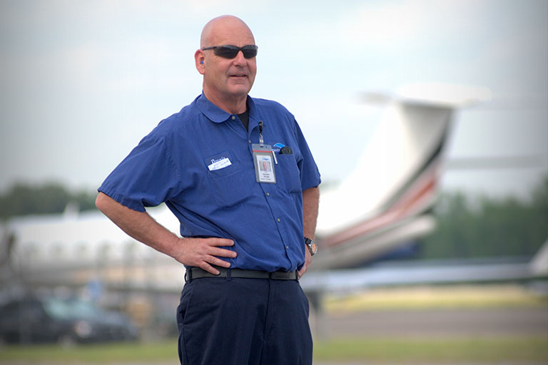 Dennis Gruba on the job as an aviation mechanic.