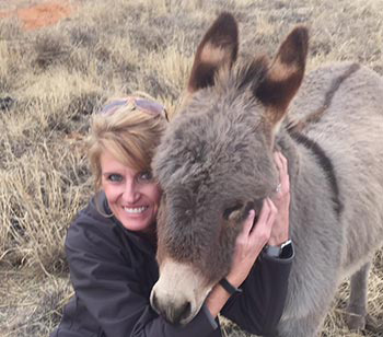 evelyn with miniature donkey