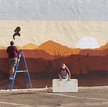 j t berry and gina davis creating mural