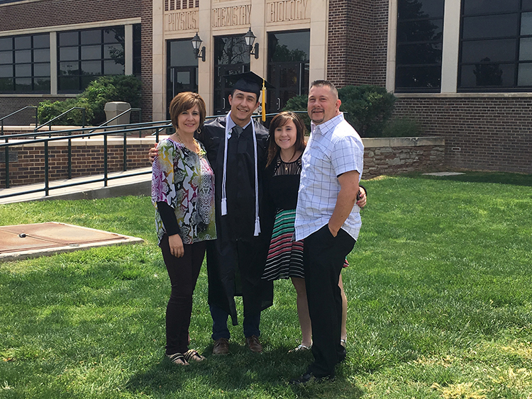 john garcia with family outside of science building