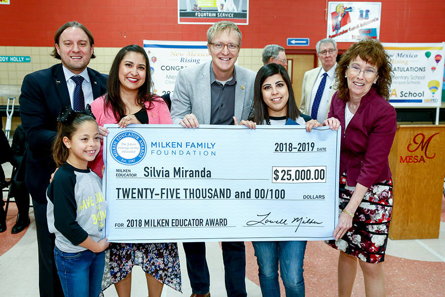Silvia Miranda, second from right, received a $25,000 Milken Educator Award on Nov. 20.