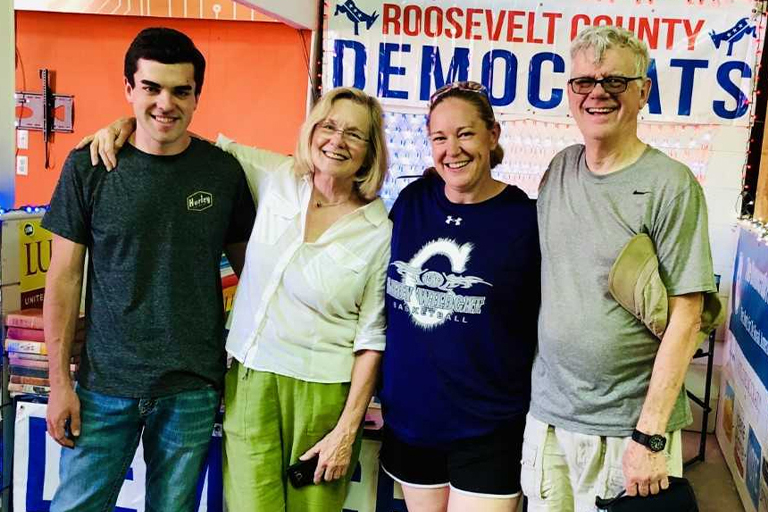 Tate Turnbough, left, working at the Democratic Party’s booth at the Roosevelt County Fair last year. 