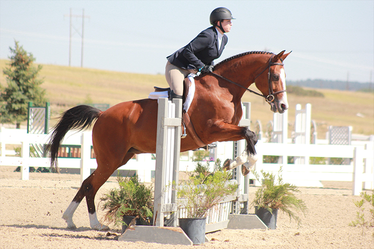 Taylor Rahn riding horse