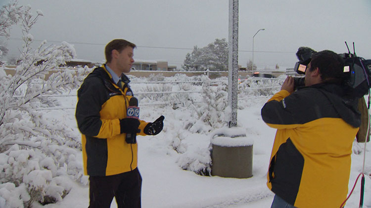 vincent in snow with camera