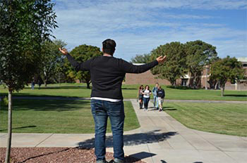 photo spot student standing on boulder