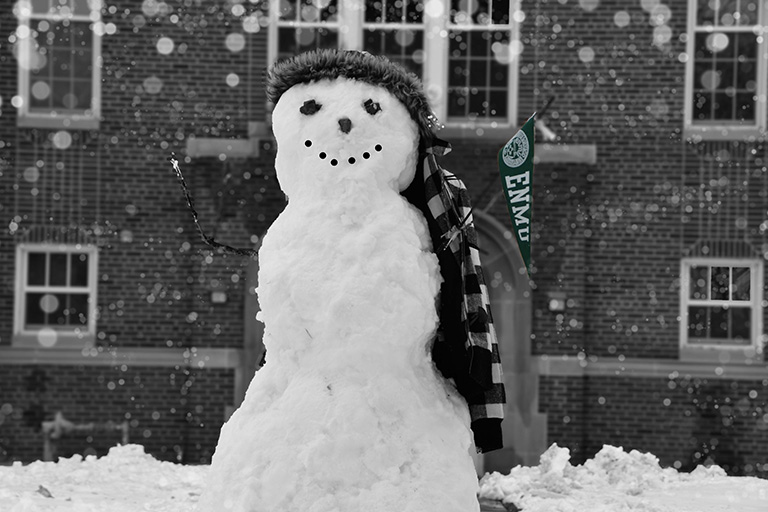 Snowman in front of the admin building