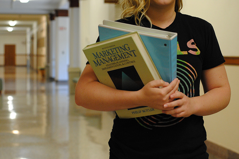 Student Holding Books