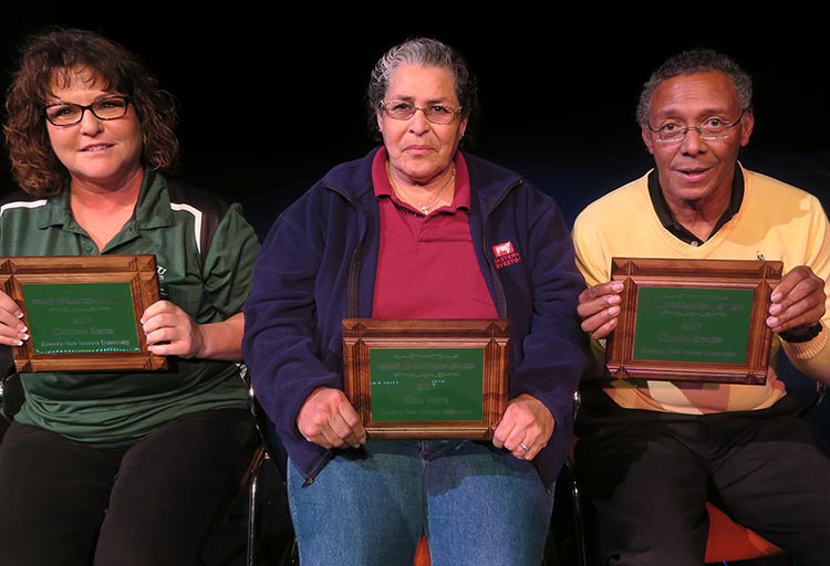 Charles (right) with fellow Spirt of Eastern Award winners Candace Baros (left) and Cruz Parra (center).