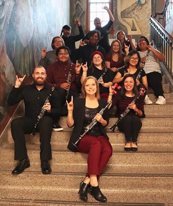 dr shuler on stairs with student group