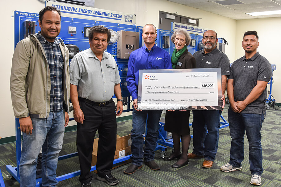 (Left to right) Dr. Sarbagya Ratna Shakya, assistant professor of Electrical Engineering Technology-ENMU, Dr. Hamid Allamehzadeh – Professor of Electrical Engineering Technology- ENMU; Kenton Martin – Project Development Manager – EDFR-DSP; ENMU Chancellor, Dr. Patrice Caldwell; Johnny Garcia – Site Manager – EDFR-AO; Nathan Tarango – Sr. Wind Technician – EDFR-AO