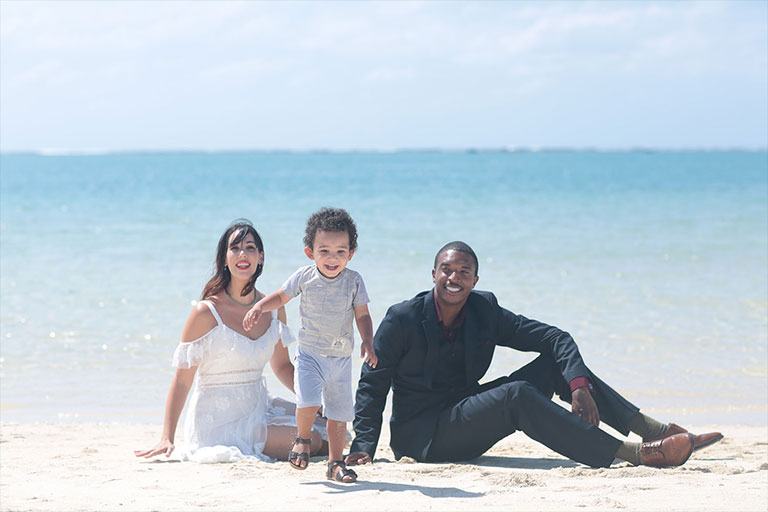 Isabelle Coudron with her husband and son. 