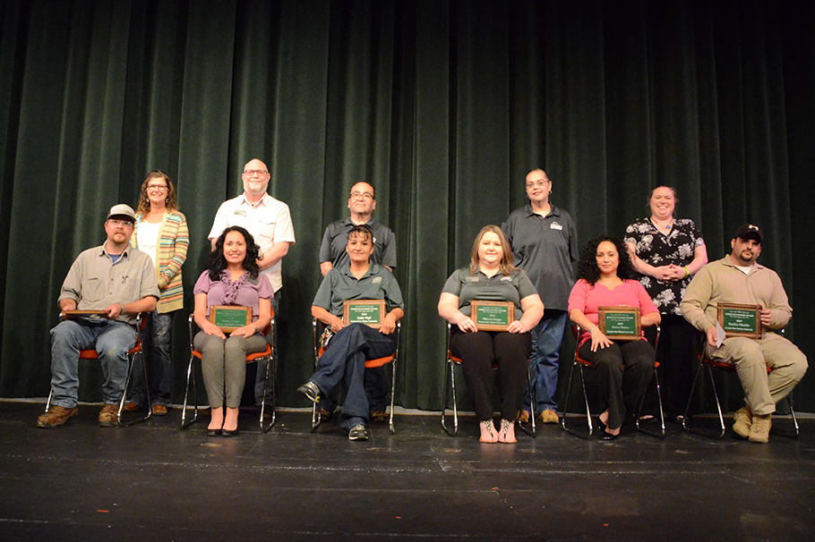 Last year's Spirit of Eastern award recipients (standing) and this year's recipients.