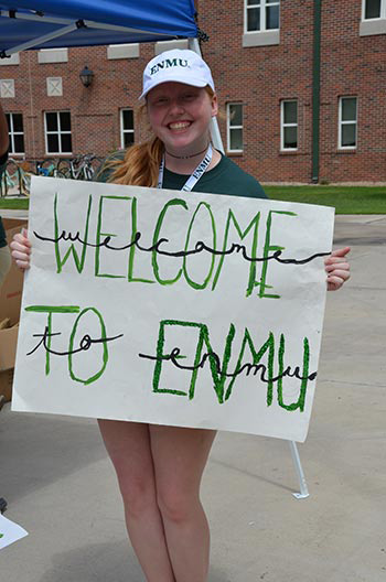 courtney thatcher with sign