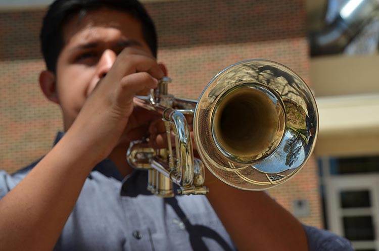 luis burke playing trumpet