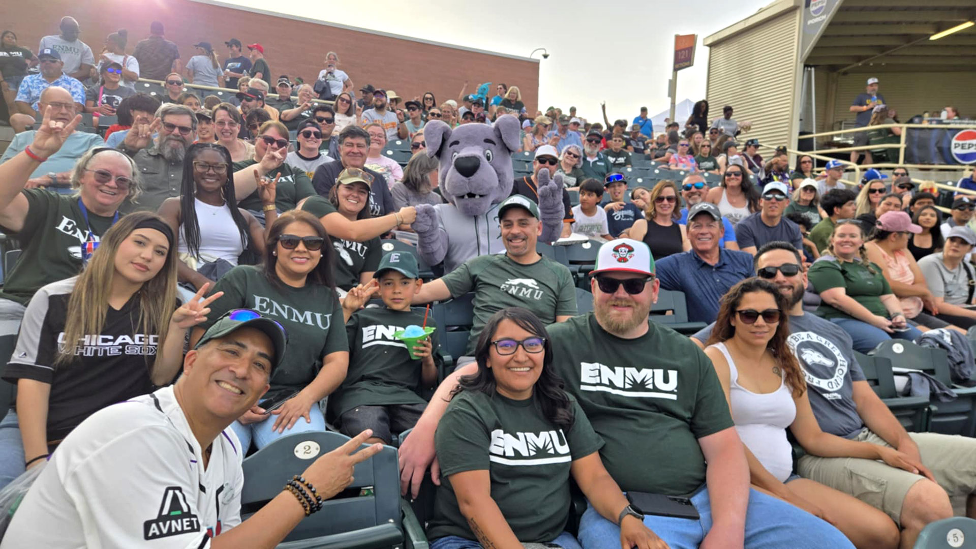ENMU Alumni Day with the Isotopes Photo with Ralphie in the Middle