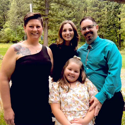 Lacy Keith with her Husband and Two Daughters